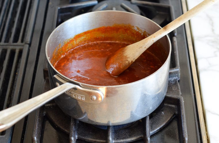 Cooking and Simmering Homemade Spicy Barbecue Sauce
