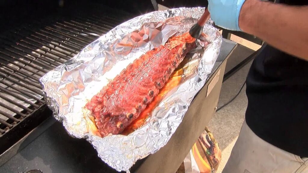 Wrapping the ribs in foil to Smoked Ribs