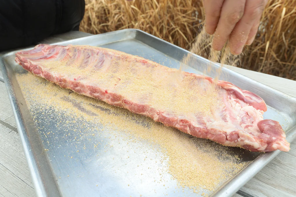 Rub the BBQ salt generously onto your meat before cooking