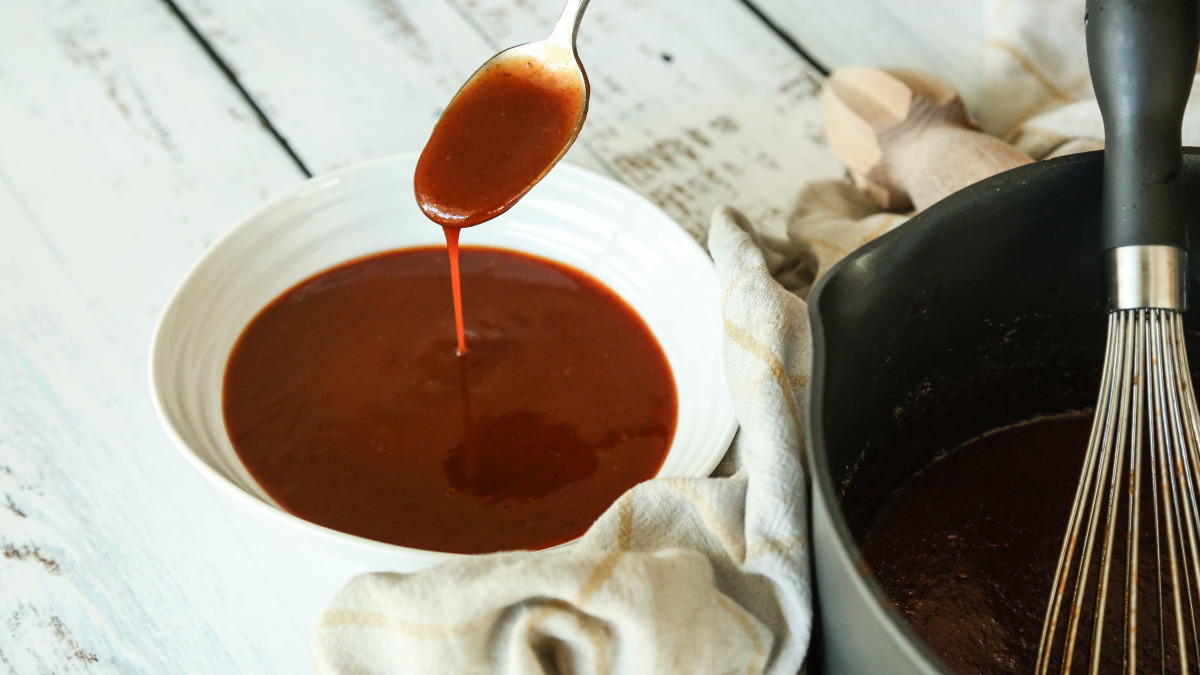 Taste and Adjusting bbq sauce recipe and transferring in a bowl to cool