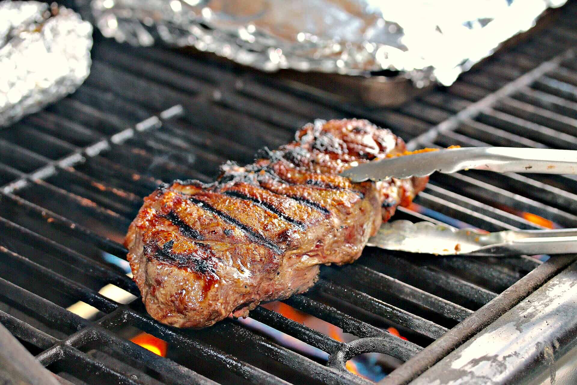 flipping your steak on the grill