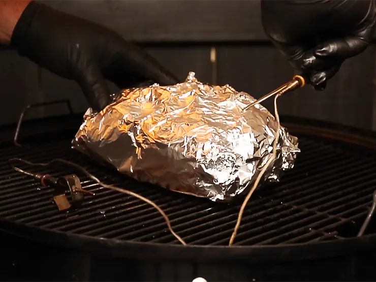 Wrap the pork tightly in aluminum foil.