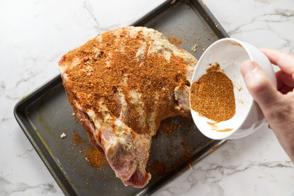 Rub the pork all over with a blend of your favorite spices