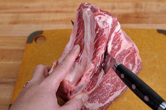 Preparing a prime rib roast on the BBQ: Removing Excess Fat Between Ribs