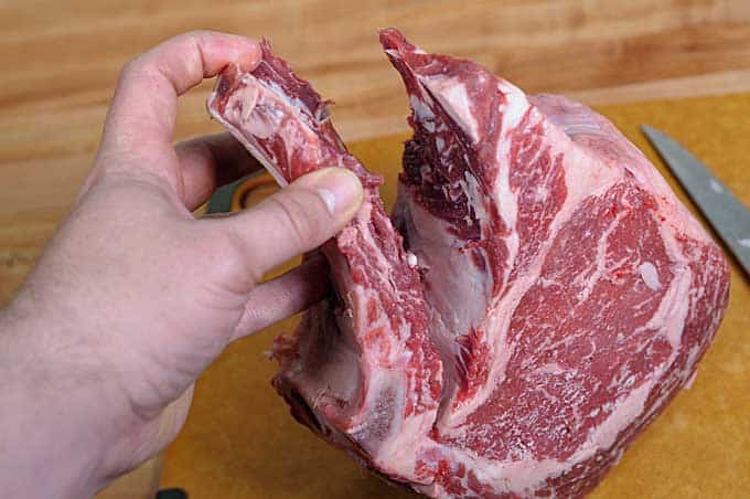 Preparing a prime rib roast on the BBQ: Frenching the Bones 