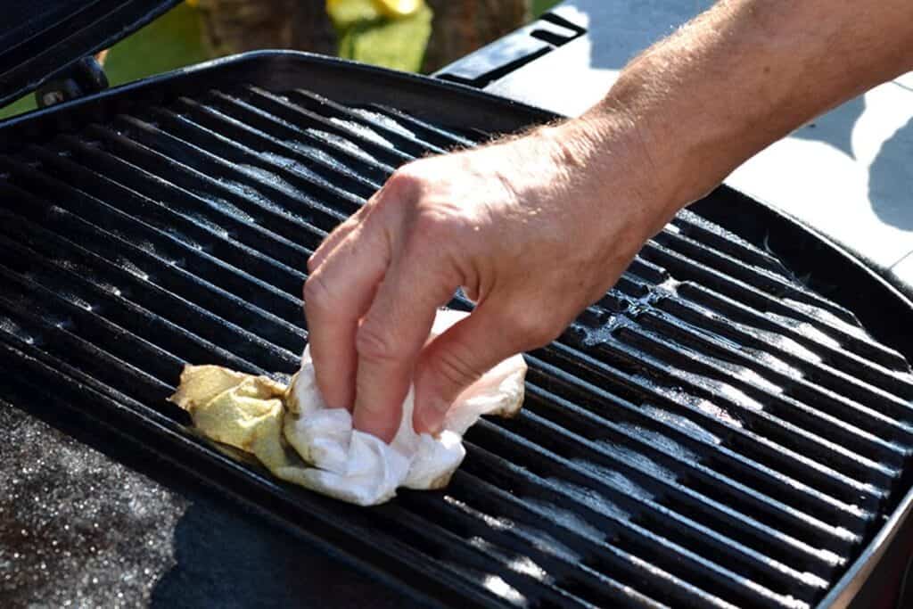 Cleaning Stainless Steel BBQ Grates with Soft Brushes and Cloth