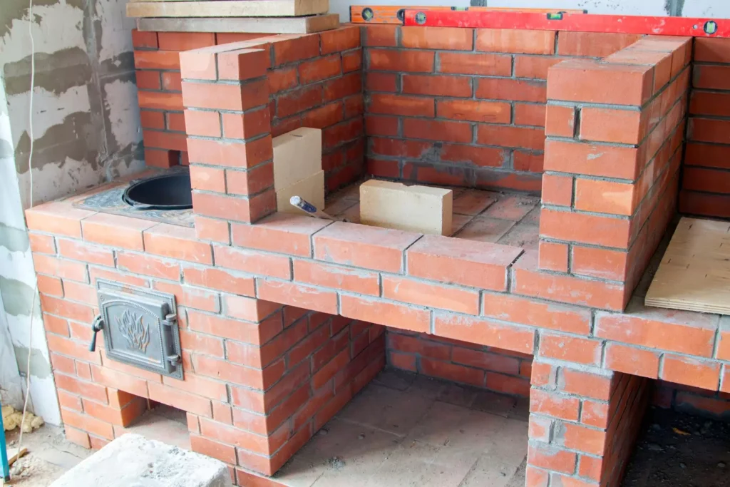 Easy-to-follow guide for making a brick BBQ with a chimney: Installing the Grill Supports