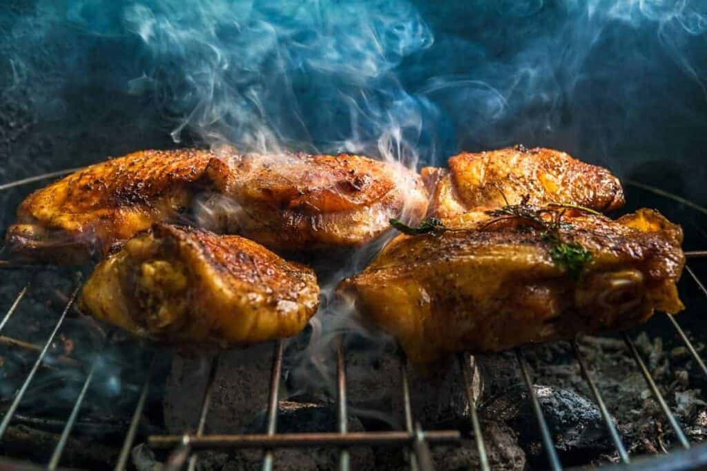 Step-by-step guide to Grilling Chicken Thighs and Legs on a charcoal grill