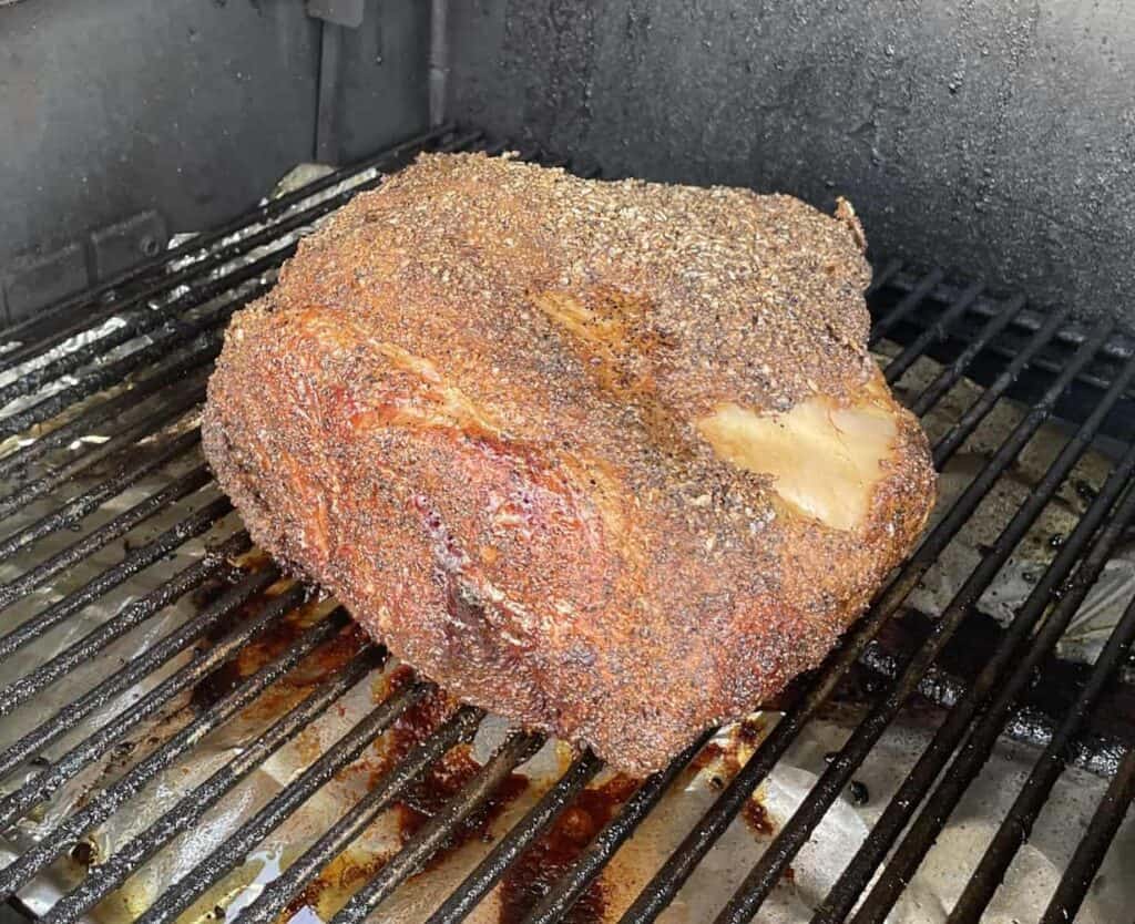 Place the pork butt directly on the smoker grates