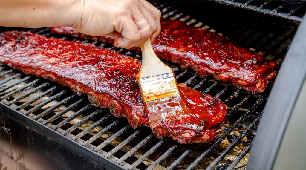 apply BBQ sauce in a smoke ribs