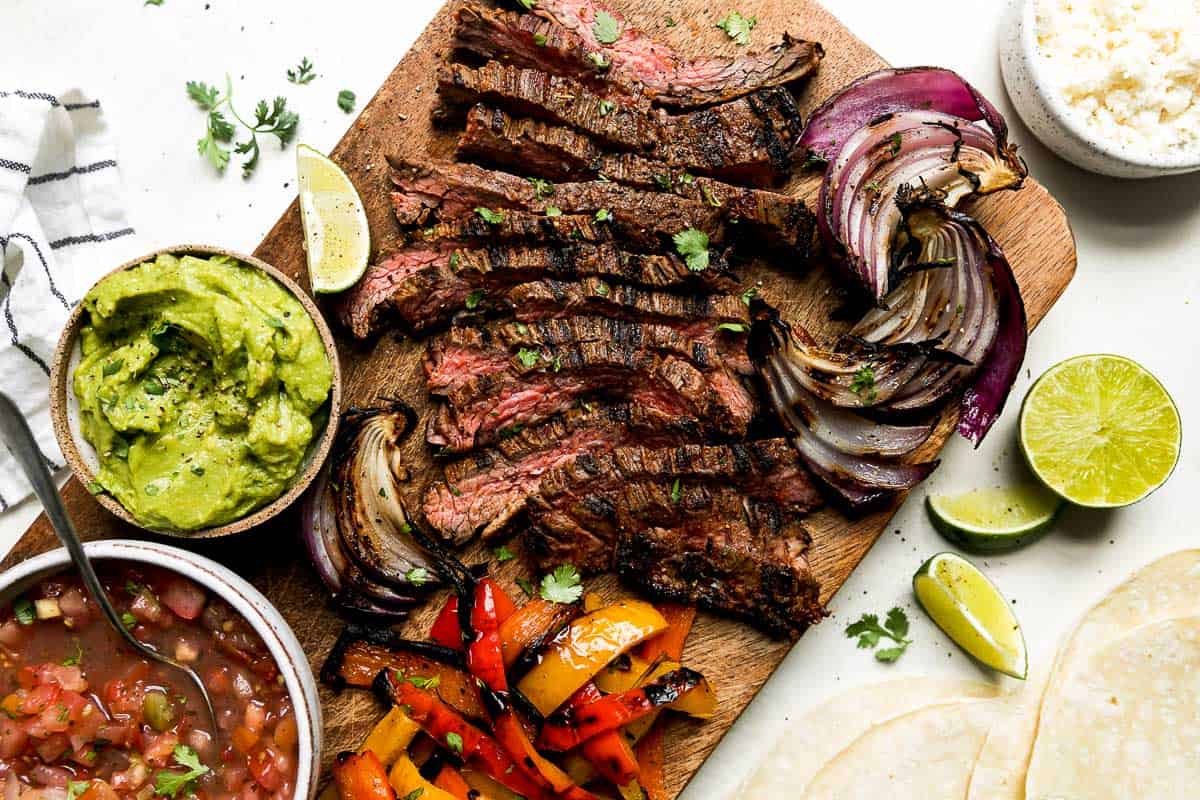 Serving BBQ Skirt Steak with side dishes