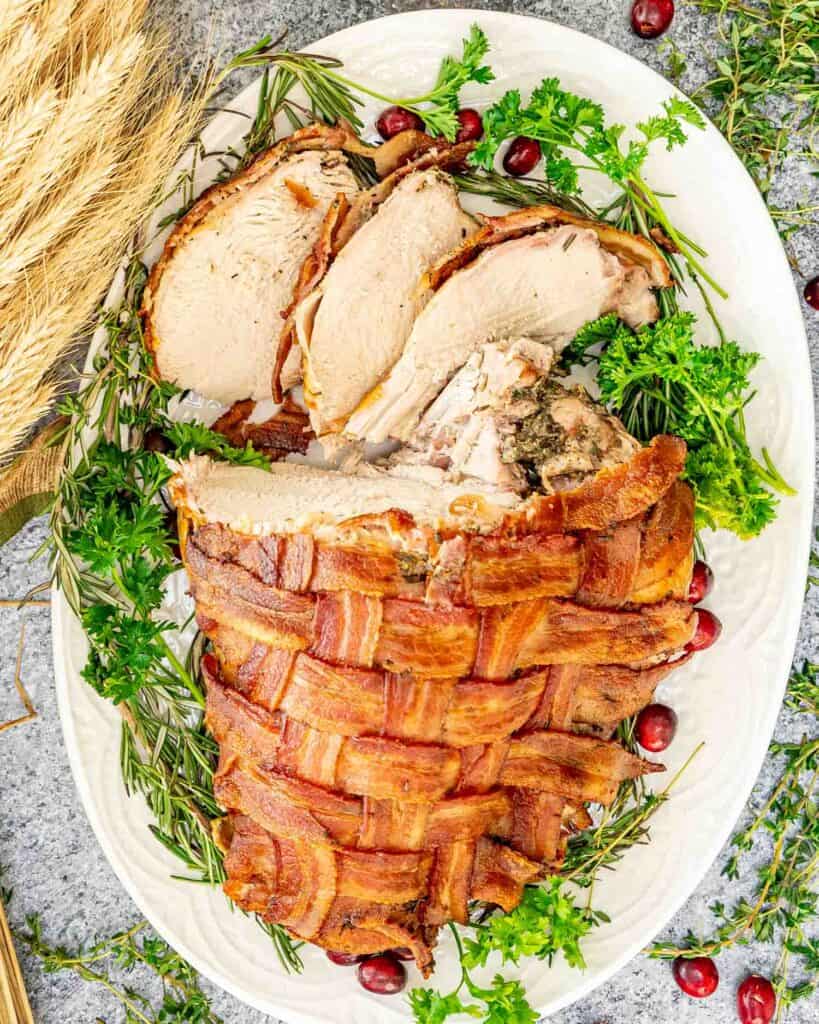 Combining Savory Flavors with BBQ Techniques of BBQ Bacon-Wrapped Turkey Breasts