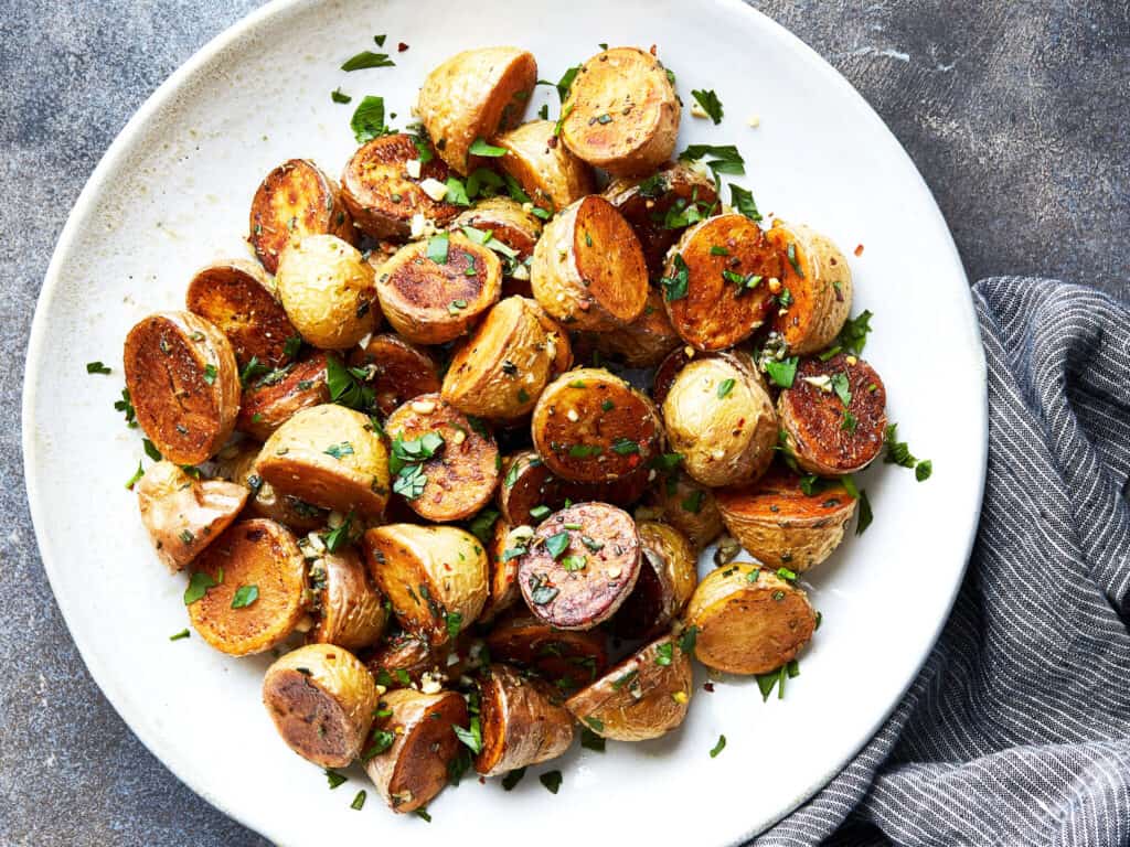 Making the perfect BBQ Garlic and Herb Roasted Potatoes